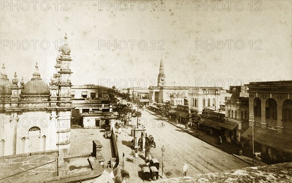 Dhurumtollah Street, Calcutta. View of Dhurumtollah Street taken from a balcony. The decorative domes of a mosque can be seen on the left. Calcutta (Kolkata), India, circa 1890. Kolkata, West Bengal, India, Southern Asia, Asia.