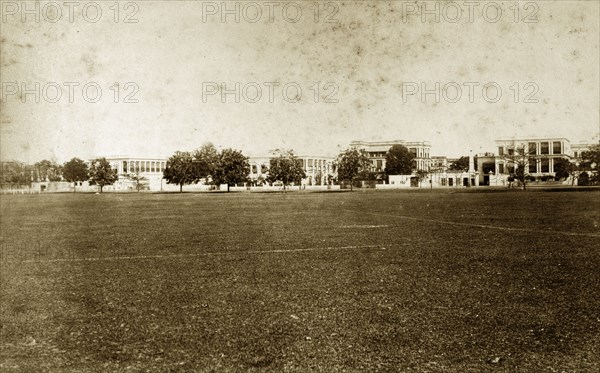 Chowringhee Street, Calcutta. View of buildings located on Chowringhee Street taken across a wide, open lawn. Calcutta (Kolkata), India, circa 1890. Kolkata, West Bengal, India, Southern Asia, Asia.