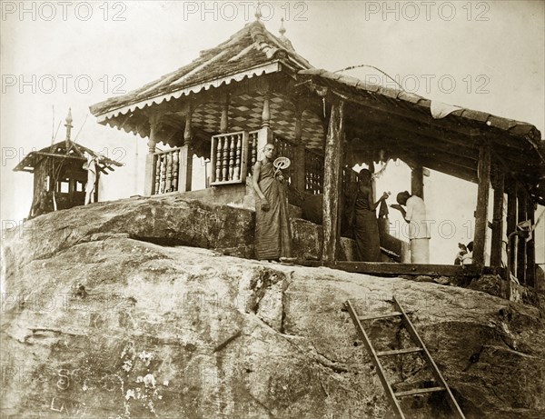 Adam's Peak shrine. Worshippers and monks at the Buddhist shrine of Adam's Peak. Ceylon (Sri Lanka), circa 1885. Sri Lanka, Southern Asia, Asia.