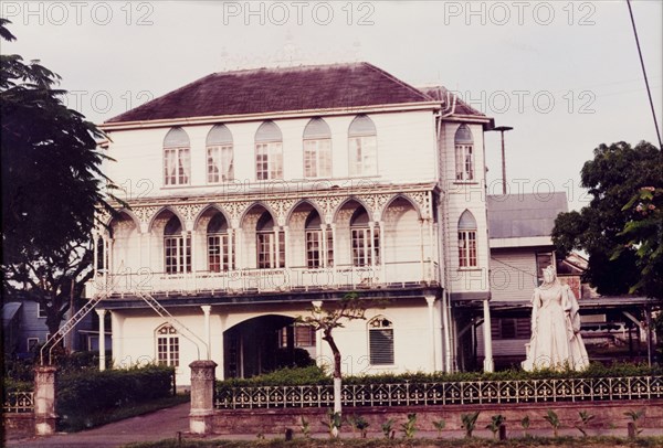 City Engineers building. A statue of Queen Victoria stands outside the City Engineers building. Georgetown, Guyana, circa 1994. Georgetown, Demerara-Mahaica, Guyana, South America, South America .