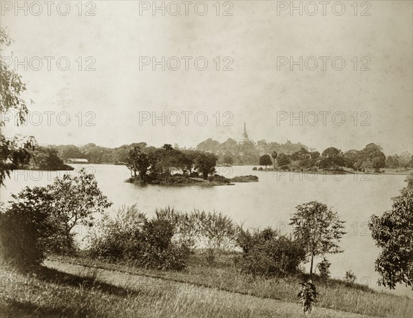 Royal Lakes, Rangoon. View over the Royal Lakes showing the Buddhist Shwe Dagon Pagoda in the distance. Rangoon (Yangon), Burma (Myanmar), circa 1885. Yangon, Yangon, Burma (Myanmar), South East Asia, Asia.