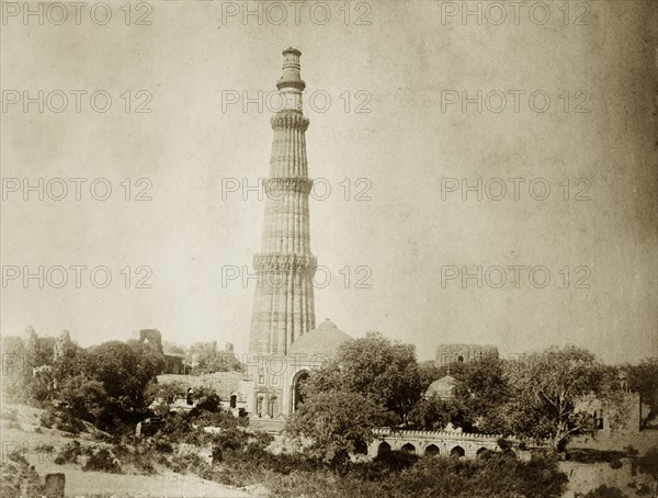 The Qutb Minar, circa 1885. View of the Qutb Minar, one of the greatest monuments of Islamic architecture in India. At 72.5 metres tall, the celebratory victory tower was built to accompany the Quwwat-ul-Islam mosque, and was probably inspired by the style of Afghan minarets. Delhi, India, circa 1885. Delhi, Delhi, India, Southern Asia, Asia.