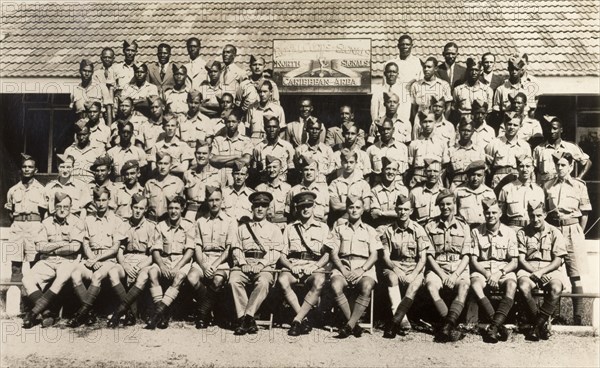 Royal Corps of Signals, Caribbean. The Caribbean Area regiment of the Royal Corps of Signals assemble outdoors for a group portrait at their headquarters. Jamaica, 1943. Jamaica, Caribbean, North America .