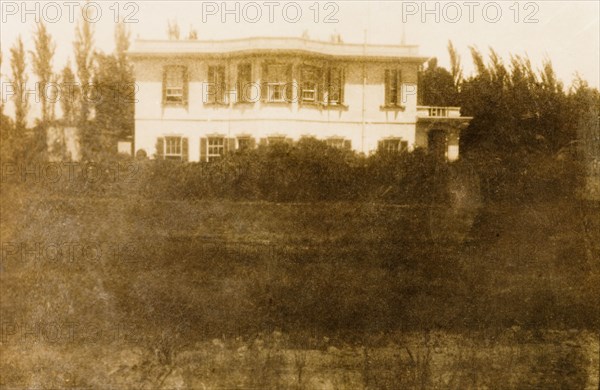 Colonial house in Lima, Peru. A two-storey colonial-style house belonging to Archie Cooper, Chief Executive Officer of the Peruvian Corporation, is set amidst lush vegetation in the Miraflores district of Lima. Lima, Peru, 1920. Lima, Lima Metropolitana, Peru, South America, South America .
