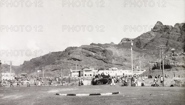 Patrols during the Arab riots in Aden, 1947. A light armoured vehicle patrols a street in Aden, during the Arab riots that took place between 1-3 December 1947 in response to the United Nations Partition Plan for Palestine. Aden, Yemen, December 1947. Aden, Adan, Yemen, Middle East, Asia.