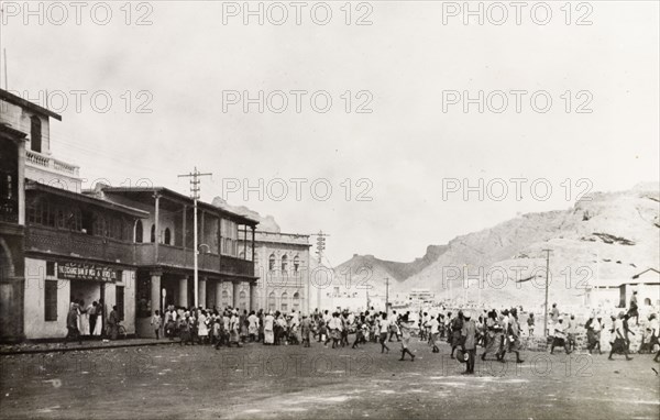 Rioting in Aden, 1947. Crowds of people fill a street in Aden during Arab riots that took place in response to the United Nations Partition Plan for Palestine. Aden, Yemen, 1-3 December 1947. Aden, Adan, Yemen, Middle East, Asia.