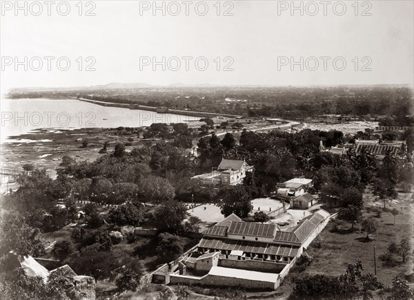 Section of Indian countryside. View taken from a high vantage point across a section of Indian countryside dotted with houses and buildings. Probably West Bengal, India, circa 1890. India, Southern Asia, Asia.