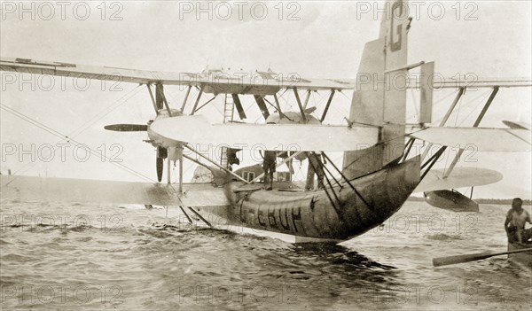 Flying boat, Nigeria. The flying boat 'Singapore', piloted by Sir Alan Cobham, is secured to a buoy in the harbour. Lagos, Nigeria, 1928., Lagos, Nigeria, Western Africa, Africa.