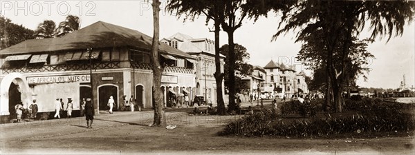 Lagos marina, Nigeria. View of the street running along the marina at Lagos, showing a building belonging to the African Oil Nuts Company. Lagos, Nigeria, circa 1925. Lagos, Lagos, Nigeria, Western Africa, Africa.