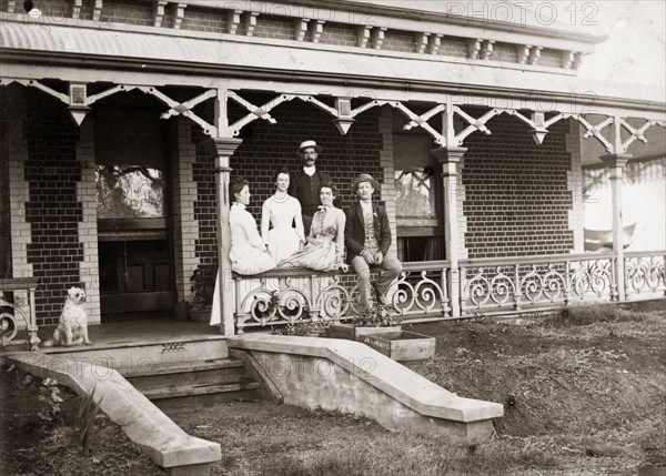 The Brodribb family at 'Wyalla'. Members of the Brodribb family posed on the veranda railing at 'Wyalla'. Toowoomba, Australia, circa 1905. Toowoomba, Queensland, Australia, Australia, Oceania.