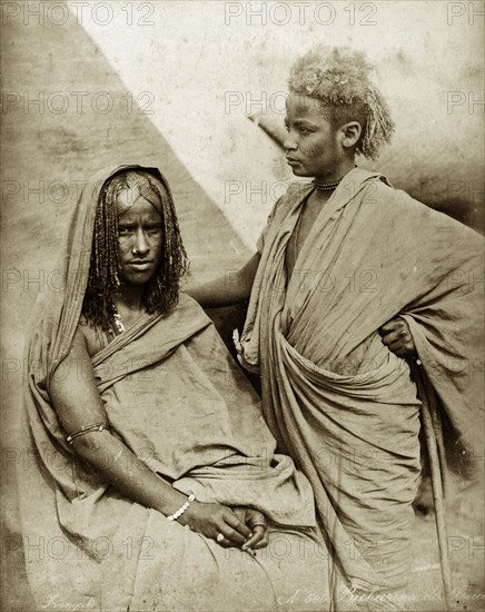 Bischarin women. Portrait of two Bisharin women, their hair worn in traditional style. Sudan, North Africa, circa 1885. Sudan, Eastern Africa, Africa.