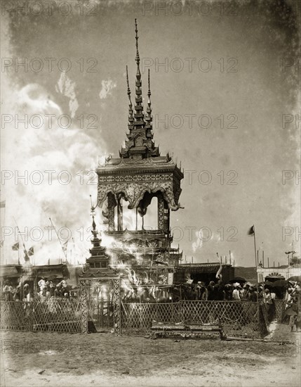 Burmese cremation ceremony. Smokes escapes into the sky at a traditional Burmese cremation ceremony. Burma (Myanmar), circa 1895. Burma (Myanmar), South East Asia, Asia.