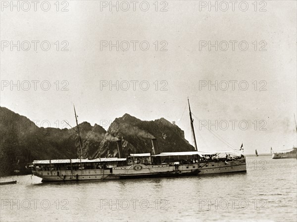 RIMS 'Lawrence'. RIMS 'Lawrence', a naval steamship belonging to the Royal Indian Marine Service, floats off shore. Indian Ocean, circa 1900., Southern Asia, Asia.