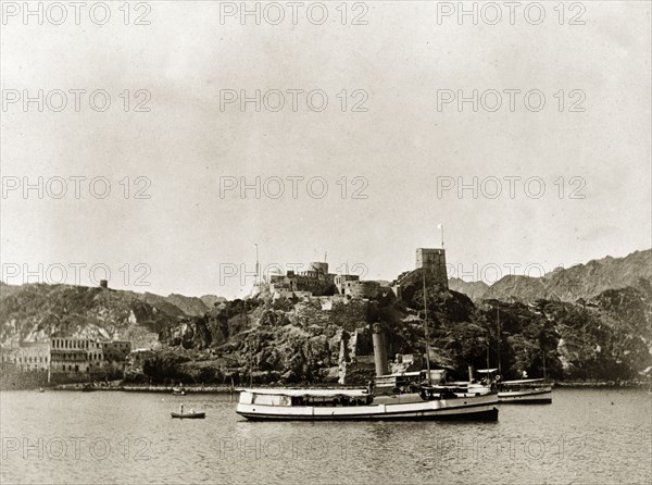 Armed launches at Muscat. Armed launch boats 'Mashone' and 'Harold' float off shore at Muscat. These vessels were both part of the Persian Gulf Operations Fleet. Muscat, Oman, circa 1900. Muscat, Muscat, Oman, Middle East, Asia.