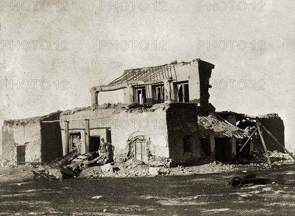 Remains of the hospital at Basidu. A European man identified as 'Lieutenant Poyntz' poses amidst the ruins of the old British Hospital on Qeshm Island. Basidu, Qeshm Island, Persia (Iran), circa 1900. Basidu, Qeshm Island, Iran, Middle East, Asia.