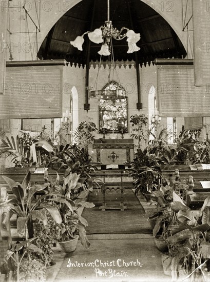 Christ Church, Ross Island. Interior shot of the altar inside Christ Church, profusely decorated with flowers and potted plants. Ross Island, India, circa 1900. Ross Island, Andaman and Nicobar Islands, India, Southern Asia, Asia.