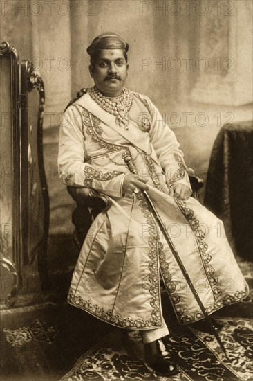 Gaekwar of Baroda. Studio portrait of Sir Sayaji Rao III (1863-1939), Gaekwar of Baroda, dressed in his robes for the Coronation Durbar at Delhi. India, circa 1902. India, Southern Asia, Asia.