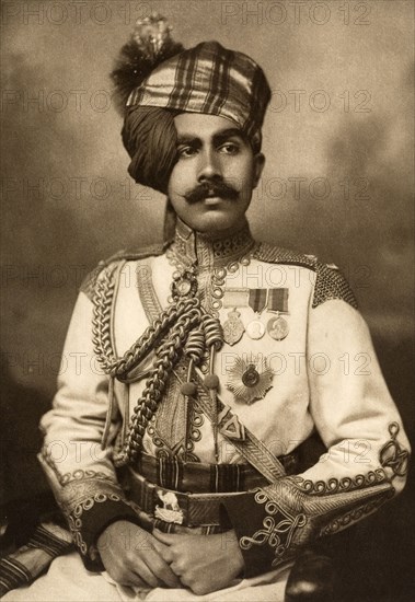 Maharajah of Bikaner. Studio portrait of Sir Ganga Singh (1880-1943), Maharajah of Bikaner, dressed in his military uniform for the Coronation Durbar at Delhi. India, circa 1902. India, Southern Asia, Asia.