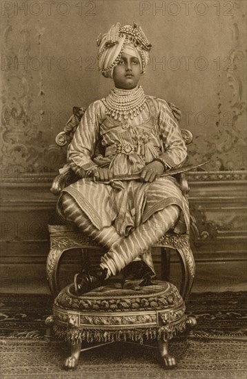 Maharajah of Patiala. Studio portrait of a young Bhupindar Singh (r.1900-1938), Maharajah of Patiala, finely dressed for the Coronation Durbar at Delhi. India, circa 1902. India, Southern Asia, Asia.