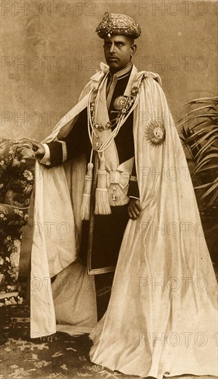 Sir Rama Varma. Studio portrait of Sir Rama Varma (1853-1943), Raja of Kochi, dressed in his robes for the Coronation Durbar at Delhi. India, circa 1902. India, Southern Asia, Asia.