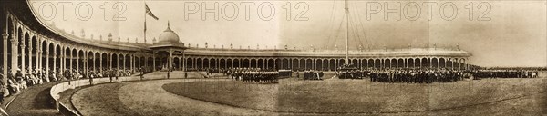 King Edward VII's Coronation Durbar, 1903. Panoramic view of a circular pavilion and arena, packed with crowds watching troops on parade at King Edward VII's Coronation Durbar. Delhi, India, 1 January 1903. Delhi, Delhi, India, Southern Asia, Asia.