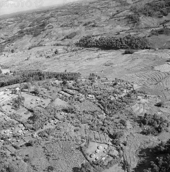 Kikuyu Reserve from the air. Aerial view taken from a Kenya Police Reserve (KPR) aircraft showing cultivated agricultural land and villages in the Kikuyu Reserve. Rift Valley, Kenya, 30 October 1952., Rift Valley, Kenya, Eastern Africa, Africa.