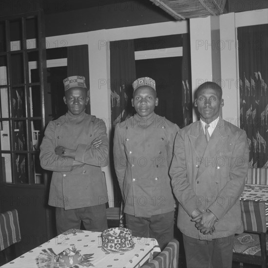 Waiters at the Equator Club. Portrait of three uniformed African waiters at the Equator Club. Nairobi, Kenya, 21 September 1957. Nairobi, Nairobi Area, Kenya, Eastern Africa, Africa.