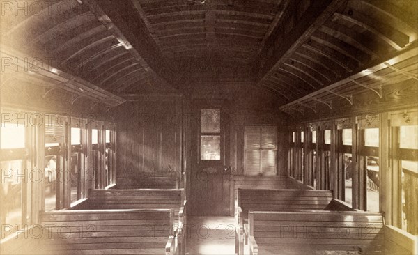 Third class carriage, Jamaica. The simple wooden interior of a Jamaica Railway third class carriage. Jamaica, circa 1895. Jamaica, Caribbean, North America .