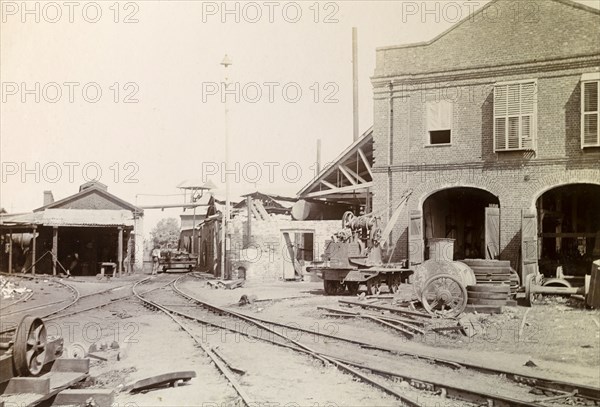 Railway sidings, Jamaica. Railway sidings criss-cross at a junction surrounded by railway utility buildings. Jamaica, circa 1895. Jamaica, Caribbean, North America .