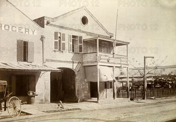 Jamaica Street Car Company. A building belonging to Kingston tramways, identified by a sign above its door that reads: 'Jamaica Street Car Co. Limited'. Kingston, Jamaica, circa 1895. Kingston, Kingston, Jamaica, Caribbean, North America .