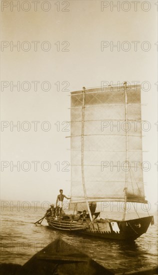 Sailing out to Nalaban Island. A small boat with a distinctive rectangular sail sets out for Nalaban Island. Orissa, India, circa 1940., Orissa, India, Southern Asia, Asia.