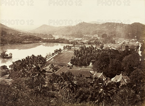View over Kandy, circa 1875. View of Kandy from Lady Horton's Walk, overlooking the Dalada Maligawa, or Temple of the Buddha's Tooth, and looking across the Esplanade towards a statue of Sir Henry Ward. Kandy Lake is visible to the left of the picture. Kandy, Ceylon (Sri Lanka), circa 1875. Kandy, Central (Sri Lanka), Sri Lanka, Southern Asia, Asia.