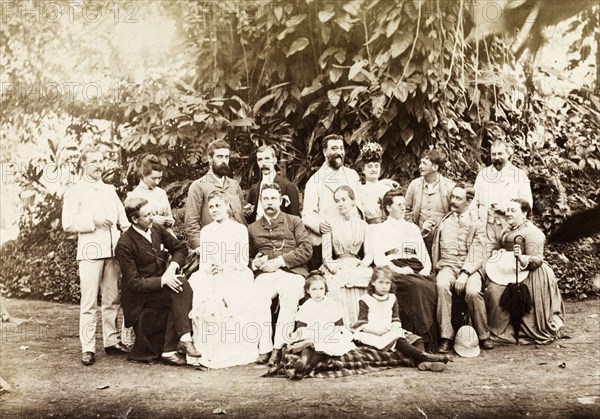 Christmas in the Botanical Gardens. Informal group portrait of 17 European men, women and children celebrating Christmas in the Botanical Gardens. Calcutta (Kolkata), India, December 1889. Kolkata, West Bengal, India, Southern Asia, Asia.