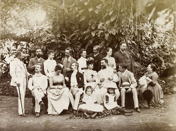 Christmas in the Botanical Gardens. Informal group portrait of 17 European men, women and children celebrating Christmas in the Botanical Gardens. Calcutta (Kolkata), India, December 1889. Kolkata, West Bengal, India, Southern Asia, Asia.