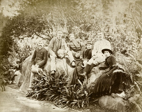 Relaxing in Eden Gardens. Informal group portrait of four European men and two women relaxing in Eden Gardens. Calcutta (Kolkata), India, circa 1885. Kolkata, West Bengal, India, Southern Asia, Asia.