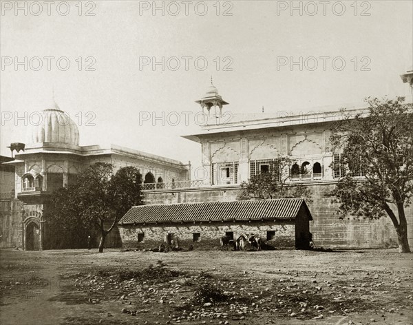 Rear view of the Diwan-i-Khas. Rear view of the Diwan-i-Khas (Hall of Private Audience) at the Delhi Fort. A low outbuilding or stable sits on the rough ground behind the pavilion. Delhi, India, circa 1885. Delhi, Delhi, India, Southern Asia, Asia.