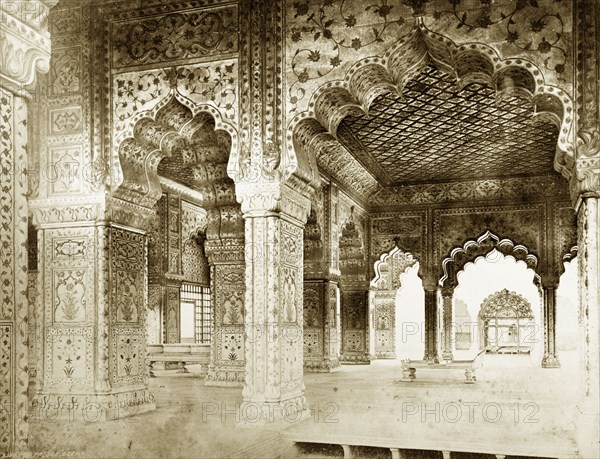 Interior of the Diwan-i-Khas, Delhi. Ornate archways decorated with painted designs adorn the Diwan-I-Khas (Hall of Public Audience) at the Delhi Fort complex. Delhi, India, circa 1885. Delhi, Delhi, India, Southern Asia, Asia.