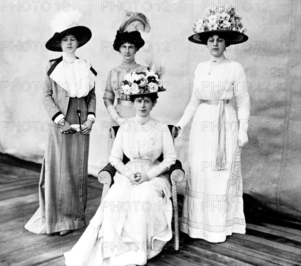 Queen Mary and her Ladies in Waiting. Portrait of Queen Mary (1867-1953) and her Ladies in Waiting, pictured aboard HMS Medina on their departure to India for the Coronation Durbar at Delhi. Probably Portsmouth, England, November 1911. Portsmouth, Hampshire, England (United Kingdom), Western Europe, Europe .