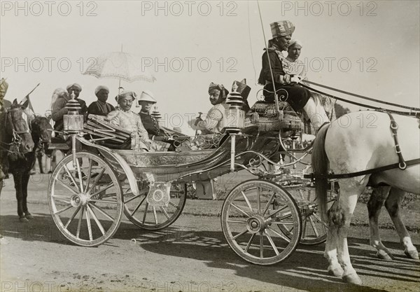 The Maharajah of Benares. The Maharajah of Benares (Varanasi) arrives at the Coronation Durbar camp in an elaborate open carriage. He was one of many Indian princes who travelled to Delhi to pay homage to King George V, Emperor of India. Delhi, India, 8 December 1911. Delhi, Delhi, India, Southern Asia, Asia.