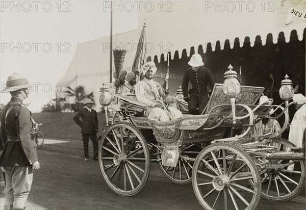 The Maharajah of Patiala. Bhupinder Singh (1891-1938), the Maharajah of Patiala, sits in his silver carriage following his presentation to King George V at the Coronation Durbar. Delhi, India, 8 December 1911. Delhi, Delhi, India, Southern Asia, Asia.