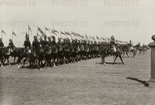 Indian cavalry parade at Delhi. An Indian cavalry regiment march past with standards at the Coronation Durbar, held in honour of King George V, Emperor of India. Delhi, India, 13 December 1911. Delhi, Delhi, India, Southern Asia, Asia.