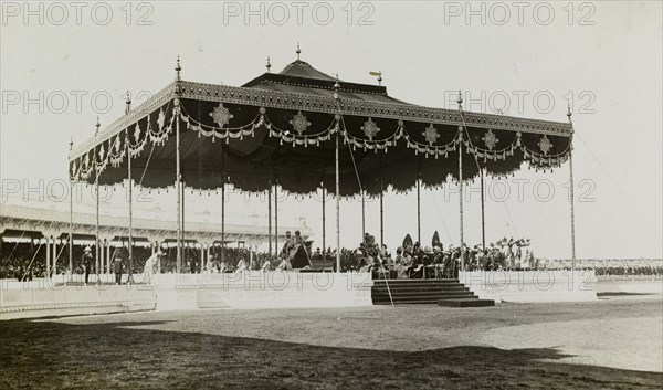 Begum of Bhopal pays homage. Nawab Sultan Jahan Begum (1858-1930), the Muslim ruler of Bhopal, pays homage to King George V (r.1910-36) and Queen Mary at the Coronation Durbar. The royal couple sit side by side, enthroned beneath the royal canopy in the Durbar arena. Delhi, India, 12 December 1911. Delhi, Delhi, India, Southern Asia, Asia.