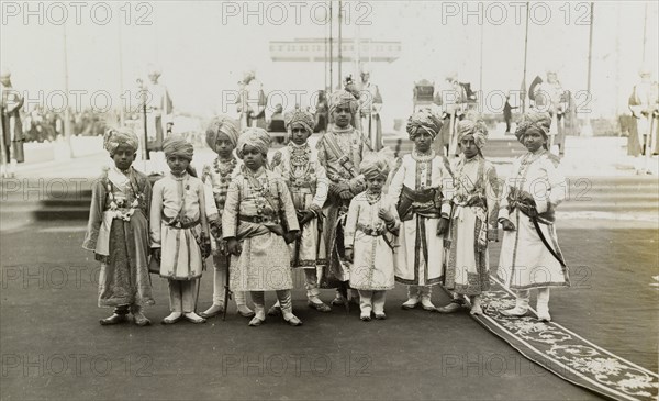 Page boys at the Coronation Durbar. Page boys to King George V and Queen Mary, dressed in ceremonial attire at the Coronation Durbar. The ten children were chosen from the sons of India's leading princely families, including Jodhpur, Bharatpur and Bikanir. New Delhi, India, 12 December 1911., Delhi, India, Southern Asia, Asia.