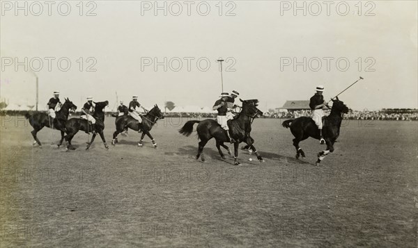 Coronation Durbar Polo Tournament. Horses and their riders in the final match of the Coronation Durbar Polo Tournament. The game was played between the Inniskilling Dragoons and the King's Dragoon Guards, the former being victorious. Delhi, India, 11 December 1911. Delhi, Delhi, India, Southern Asia, Asia.