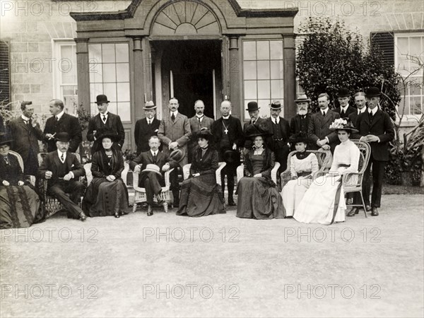 Duke of Connaught in St Helena. The Duke and Duchess of Connaught assemble for a photograph with European dignitaries outside Government House. This was one of several stops made by the royal couple on their way to Cape Town to open the new Union Parliament. St Helena, 25 October 1910. St Helena, Atlantic Ocean, Africa.