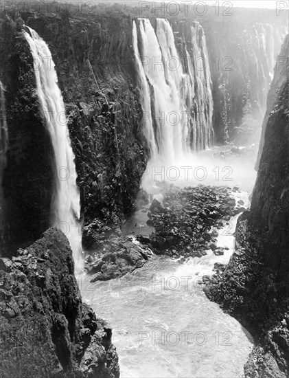 Victoria Falls. View of Victoria Falls, situated on the Zambezi River on the border between modern-day Zambia and Zimbabwe. Southern Rhodesia (Matabeleland North, Zimbabwe), 12 November 1910., Matabeleland North, Zimbabwe, Southern Africa, Africa.