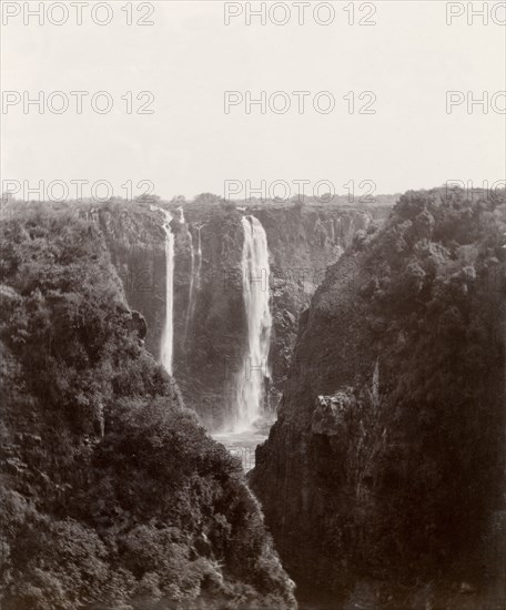 View of Victoria Falls. The Victoria Falls and surrounding cliffs as seen from the northern bank. Matabeleland, Rhodesia (Matabeleland North, Zimbabwe), 12 November 1910., Matabeleland North, Zimbabwe, Southern Africa, Africa.