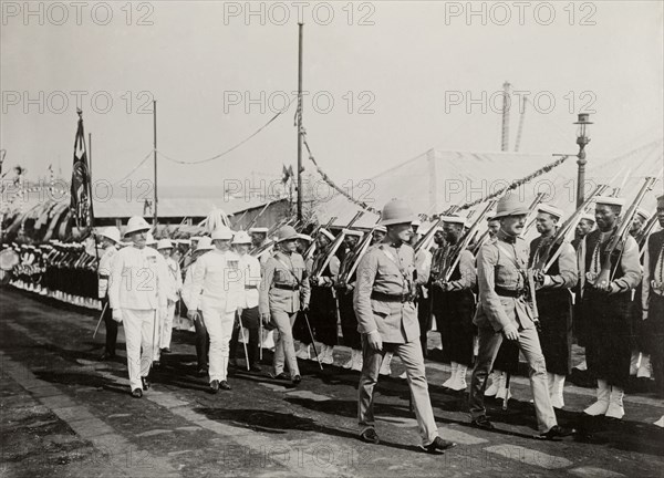 Inspection of the British South Africa Police. The Duke of Connaught inspects a line-up of police officers and cadets of the British South Africa Police at a police camp in Salisbury. Salisbury, Southern Rhodesia (Harare, Zimbabwe), 18 November 1910. Harare, Harare City, Zimbabwe, Southern Africa, Africa.