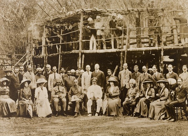 The Maharajah's hunting party. The Maharajah of Mysore (Krishna Raja Wadiyar IV, 1884-1940) and his guests, Lord and Lady Minto, pose for a group portrait at a hunting camp in the Kakankota Forests. Karnataka, India, 1909., Karnataka, India, Southern Asia, Asia.