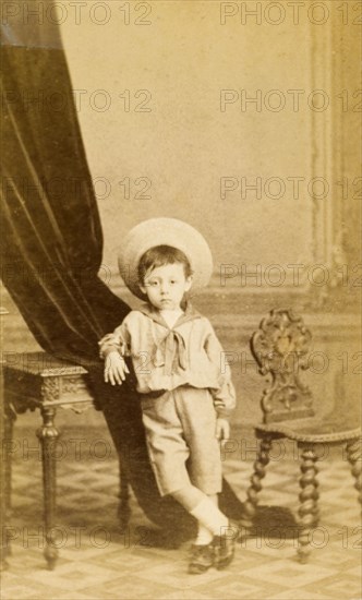 Juanito', aged three years. Studio portrait of a young boy named 'Juanito', aged three years. Gibraltar, 1881. Gibraltar, Gibraltar, Gibraltar, Mediterranean, Europe .